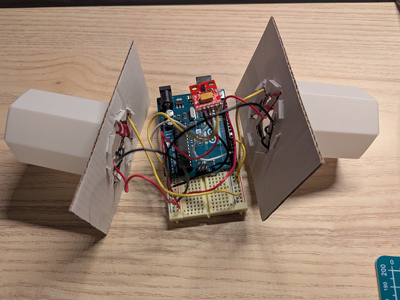 Photo of the diffusers and neoPixels assembled and plugged into the Arduino Uno. Testing them, they turned on and worked farily well without hickups